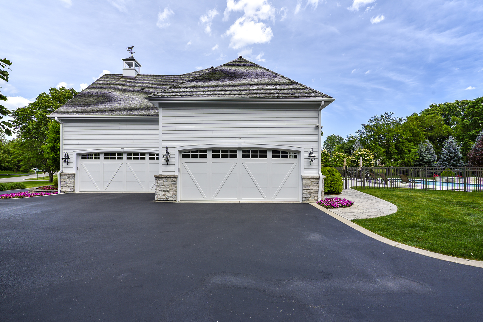 1773 Pheasant Trail Inverness, IL 60067 - Photo 54 of 54 a front view of a house with a yard and garage