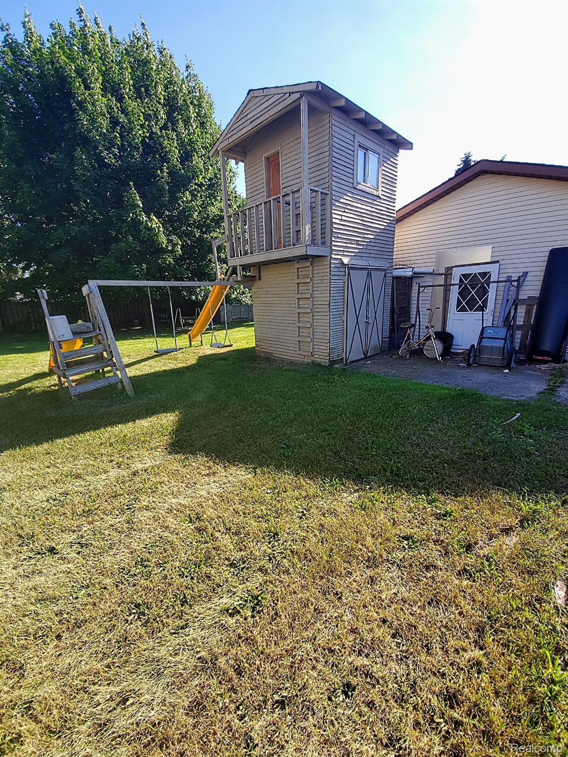 7385 Coldwater Road Flushing, MI 48433 - Photo 9 of 26 Backyard Play Set and Shed