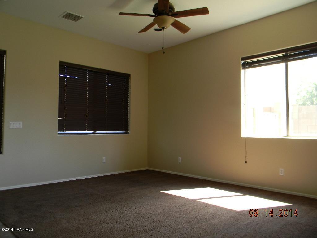 4791 Edgemont Road Prescott Valley, AZ 86314 - Photo 12 of 42 a view of an empty room with a window