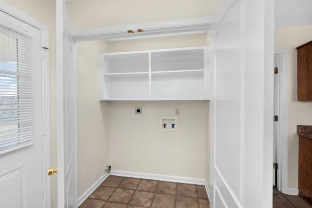 a view of a room with rack on the wall