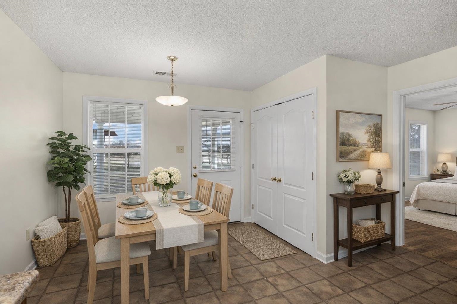 212 Feezor Street Covington, TN 38019 - Photo 10 of 31 a view of a dining room with furniture and chandelier