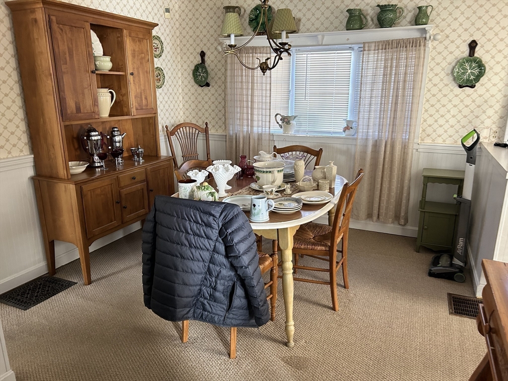 20 Shawmut Avenue New Bedford, MA 02740 - Photo 13 of 29 a dining room with furniture and a window