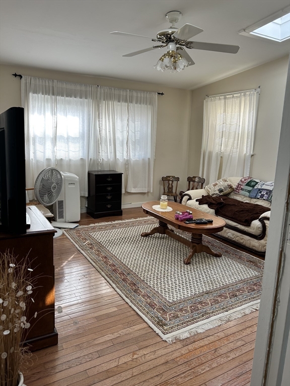 20 Shawmut Avenue New Bedford, MA 02740 - Photo 15 of 29 a living room with furniture and a fireplace