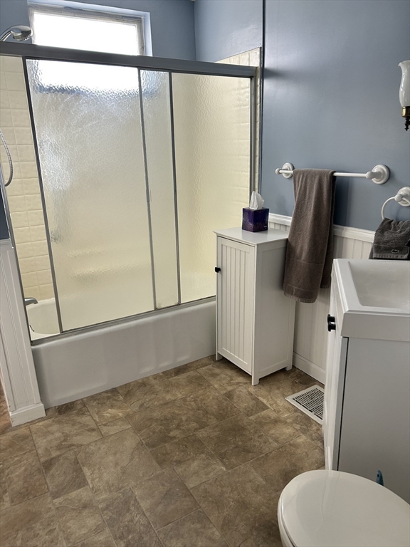 20 Shawmut Avenue New Bedford, MA 02740 - Photo 16 of 29 a bathroom with a toilet and a mirror