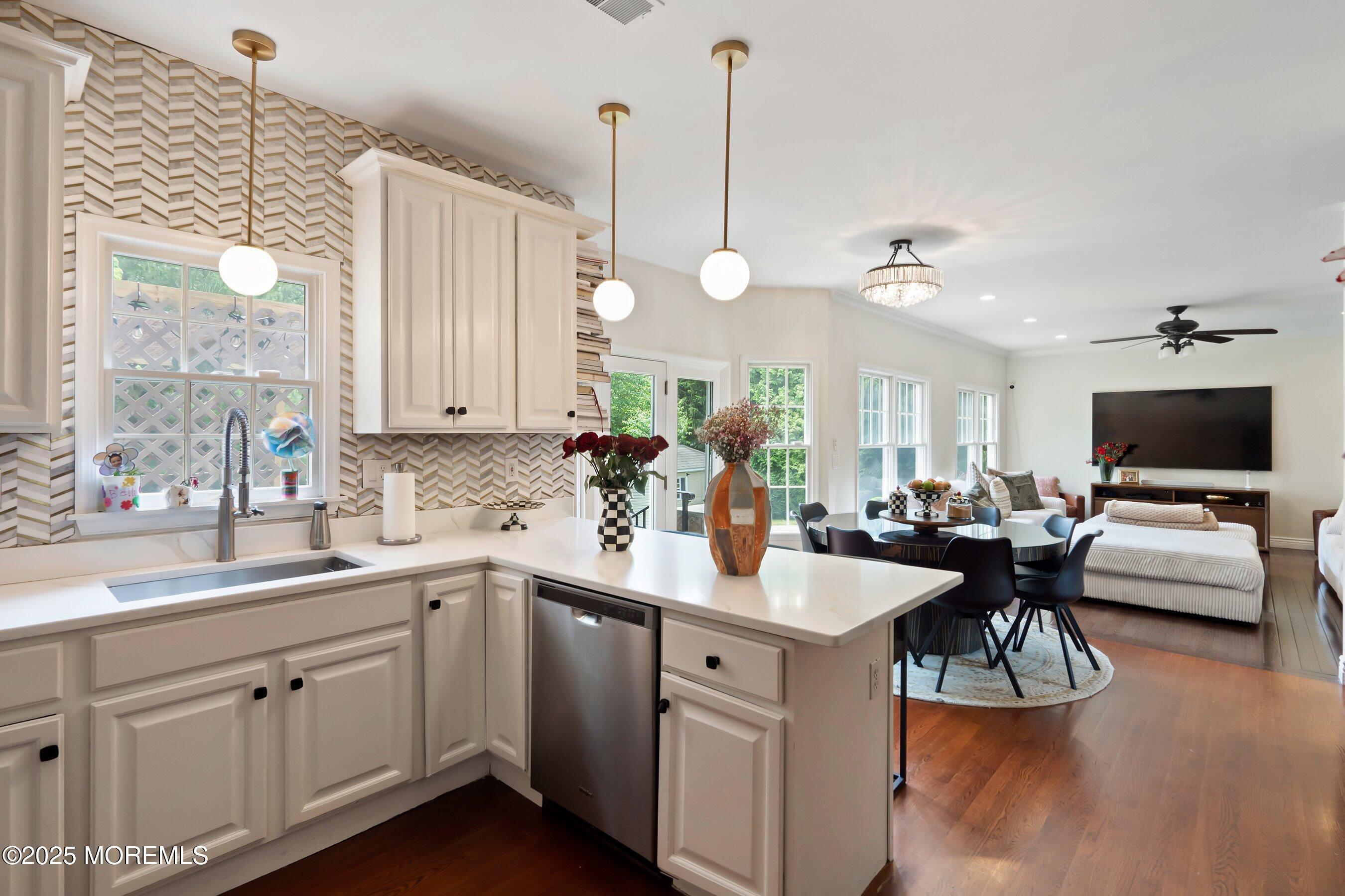 210 Rivers Glen Terrace Toms River, NJ 08755 - Photo 15 of 61 a kitchen with a sink a counter top space and a center island