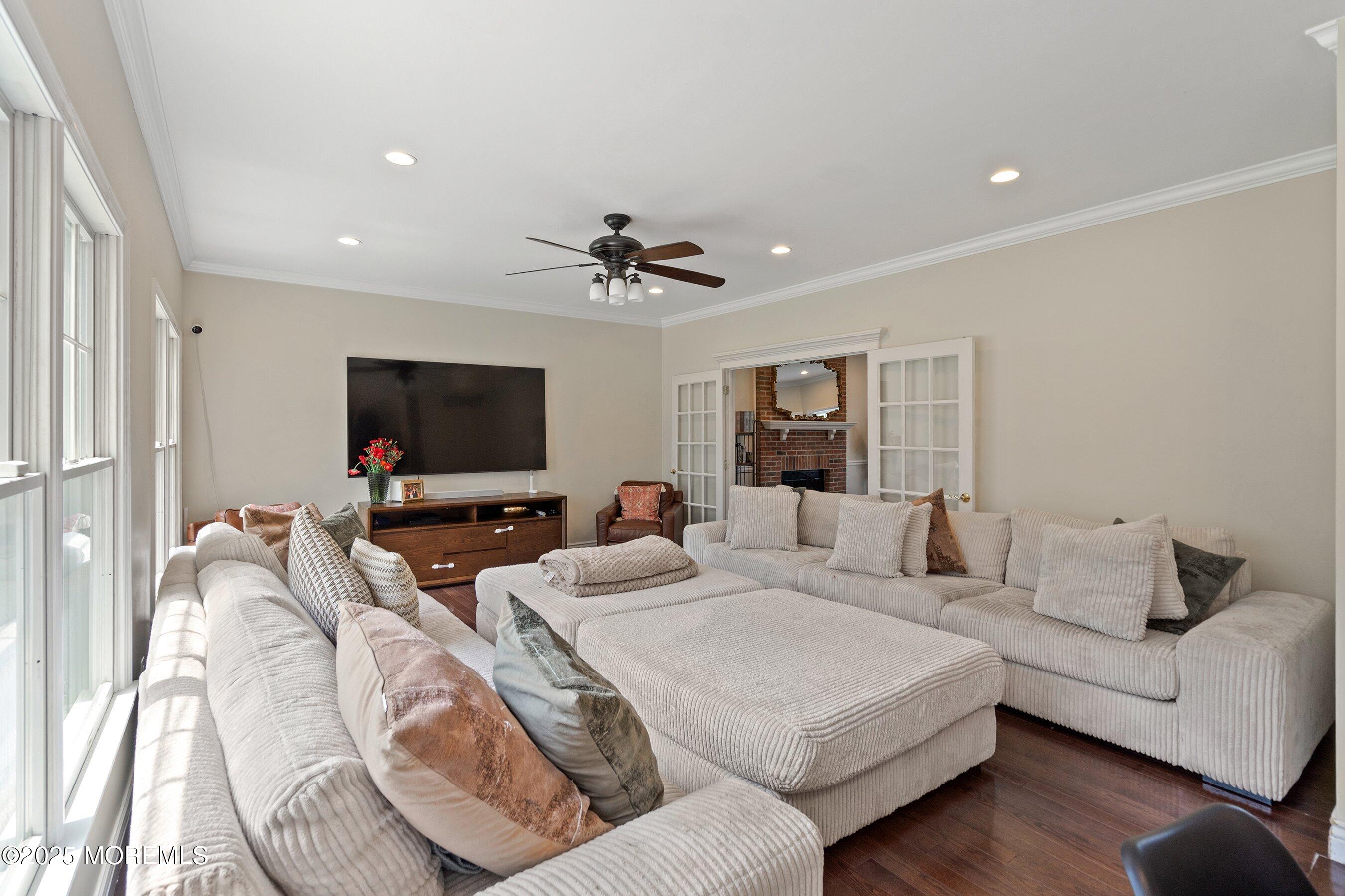 210 Rivers Glen Terrace Toms River, NJ 08755 - Photo 19 of 61 a living room with furniture and a flat screen tv