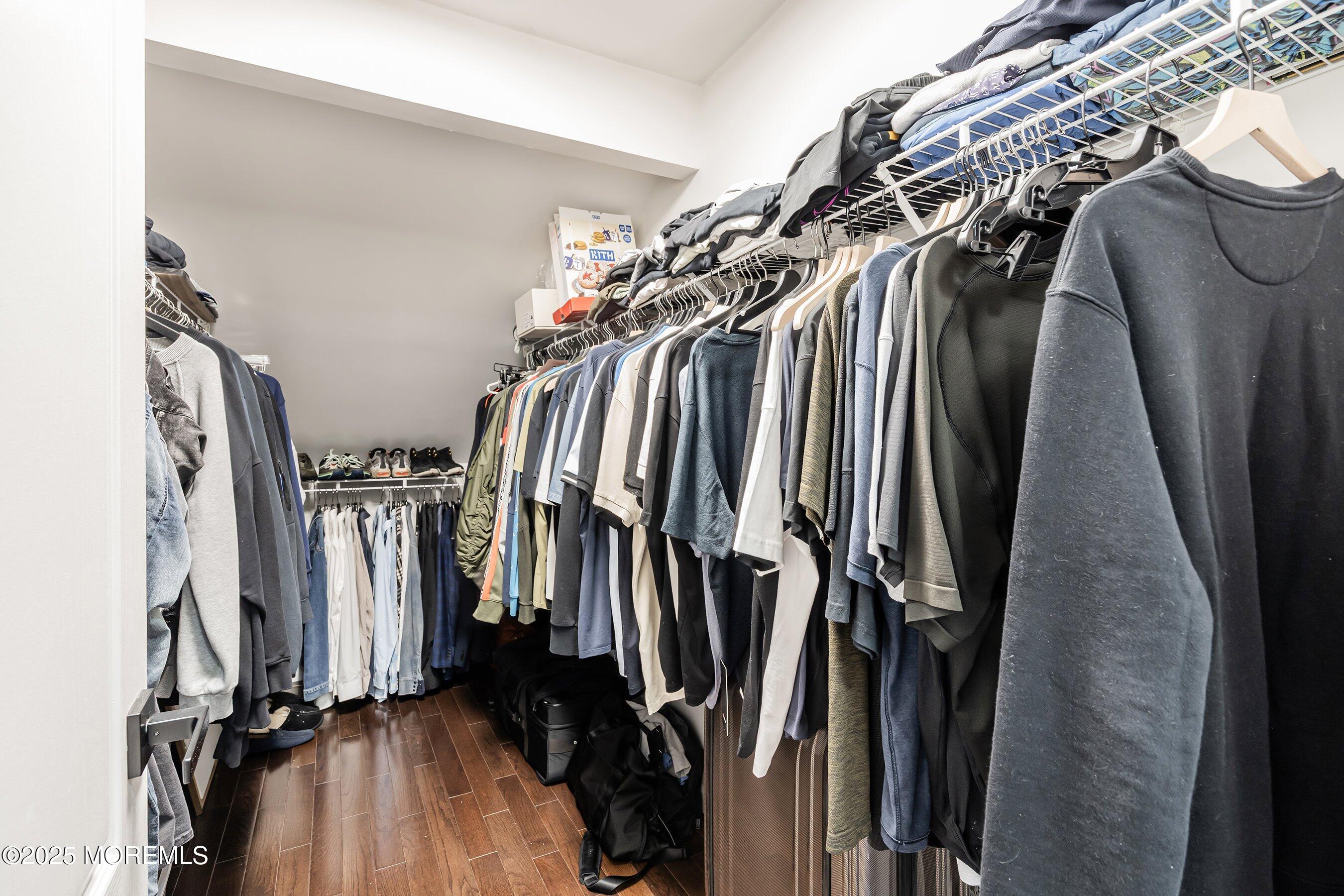 210 Rivers Glen Terrace Toms River, NJ 08755 - Photo 27 of 61 a view of walk in closet with clothes and shoes