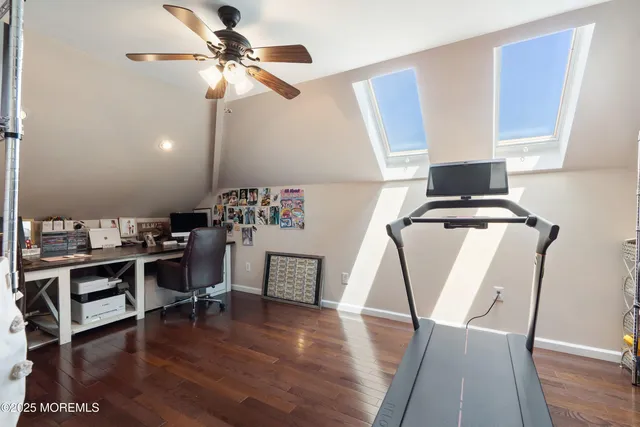 a view of a workspace with furniture