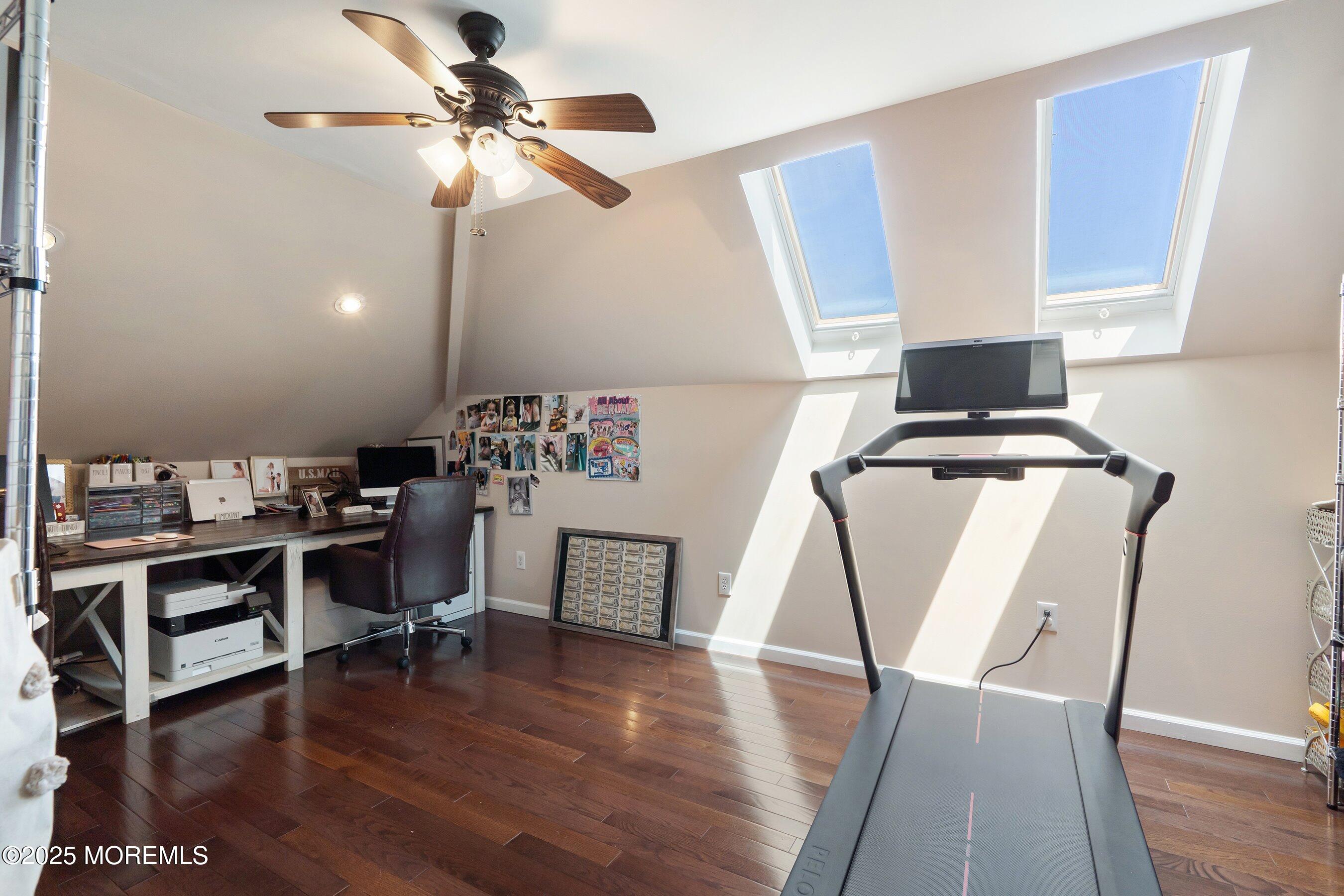 210 Rivers Glen Terrace Toms River, NJ 08755 - Photo 29 of 61 a view of a workspace with furniture and wooden floor