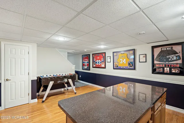 a bedroom with a bed and a cabinets