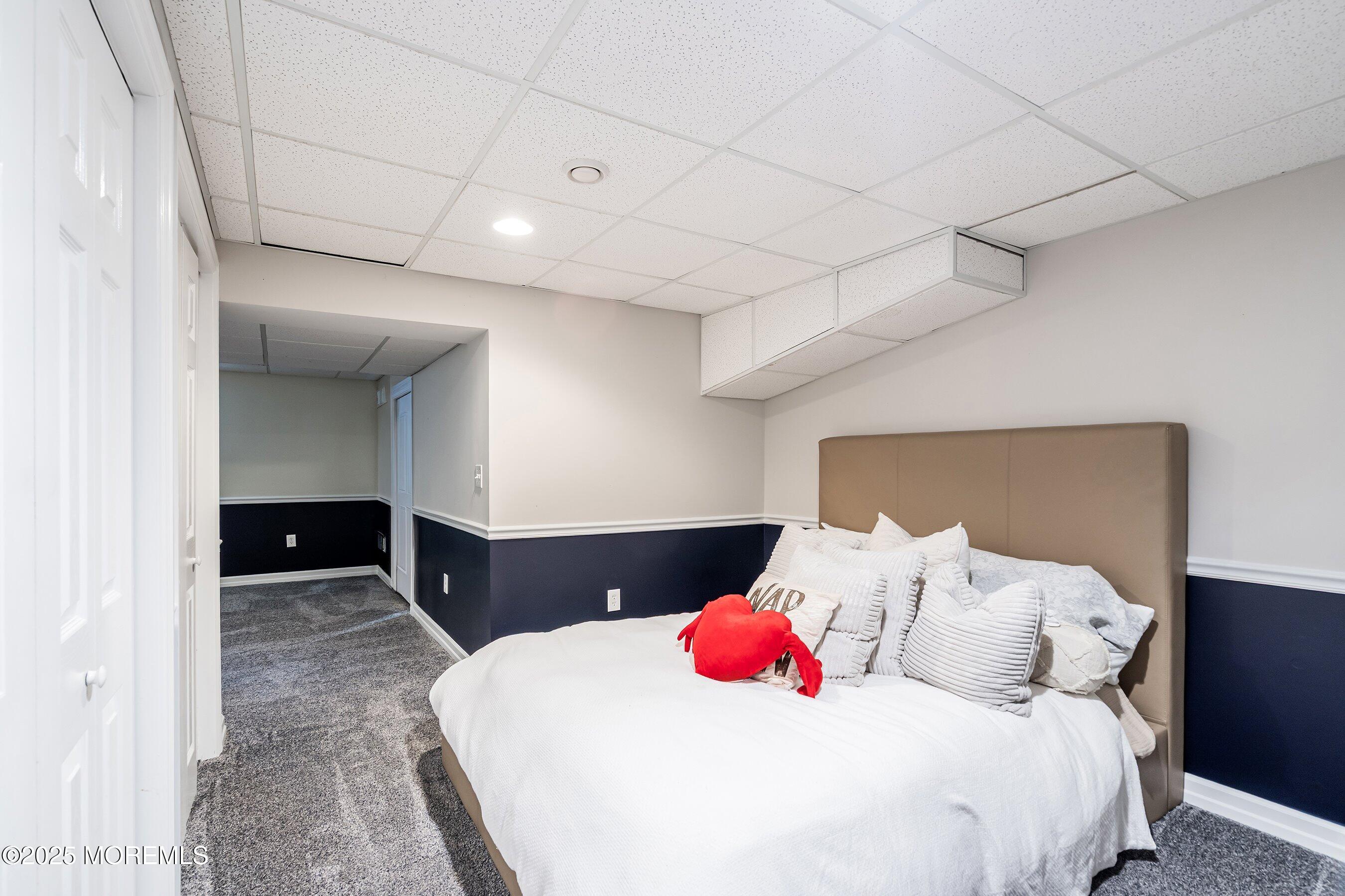 210 Rivers Glen Terrace Toms River, NJ 08755 - Photo 44 of 61 a bedroom with a bed and a cabinets