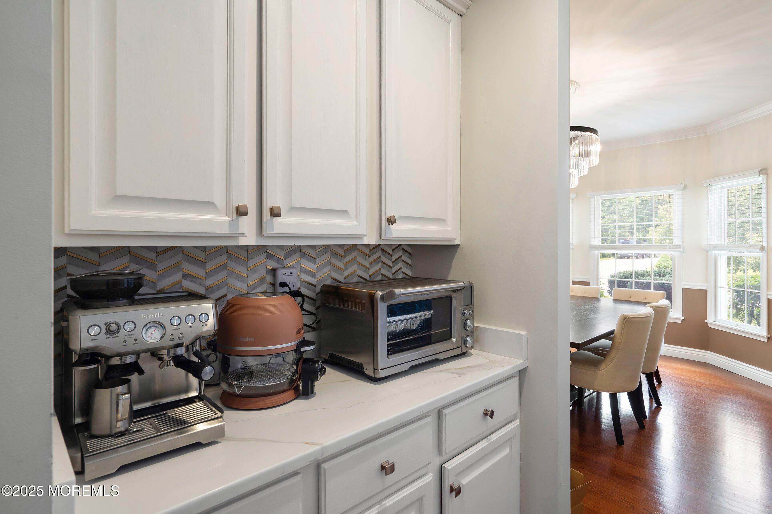 210 Rivers Glen Terrace Toms River, NJ 08755 - Photo 10 of 61 a kitchen with a stove and a white cabinets