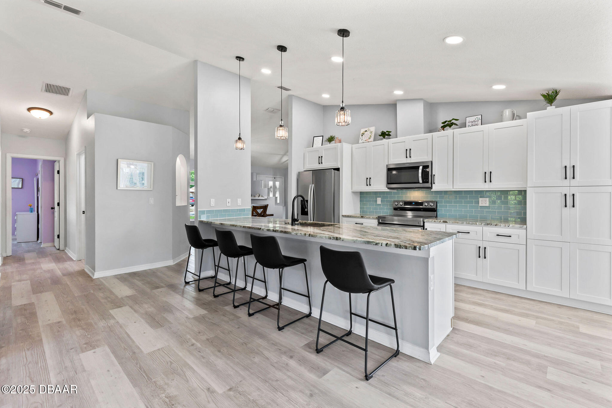 35 China Moon Drive Ormond Beach, FL 32174 - Photo 13 of 40 a large kitchen with lots of counter space and appliances