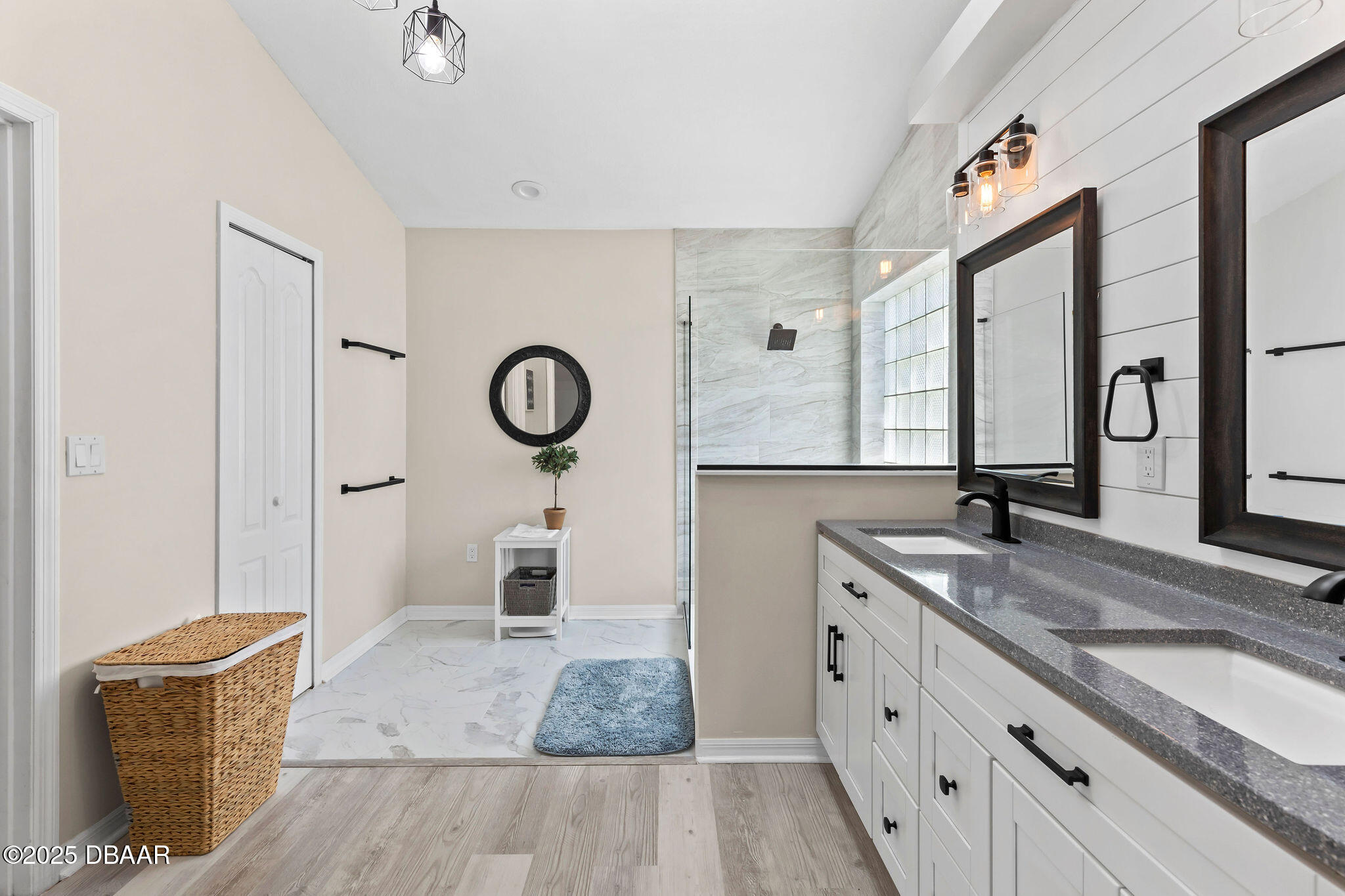 35 China Moon Drive Ormond Beach, FL 32174 - Photo 27 of 40 a spacious bathroom with a granite countertop sink and a mirror