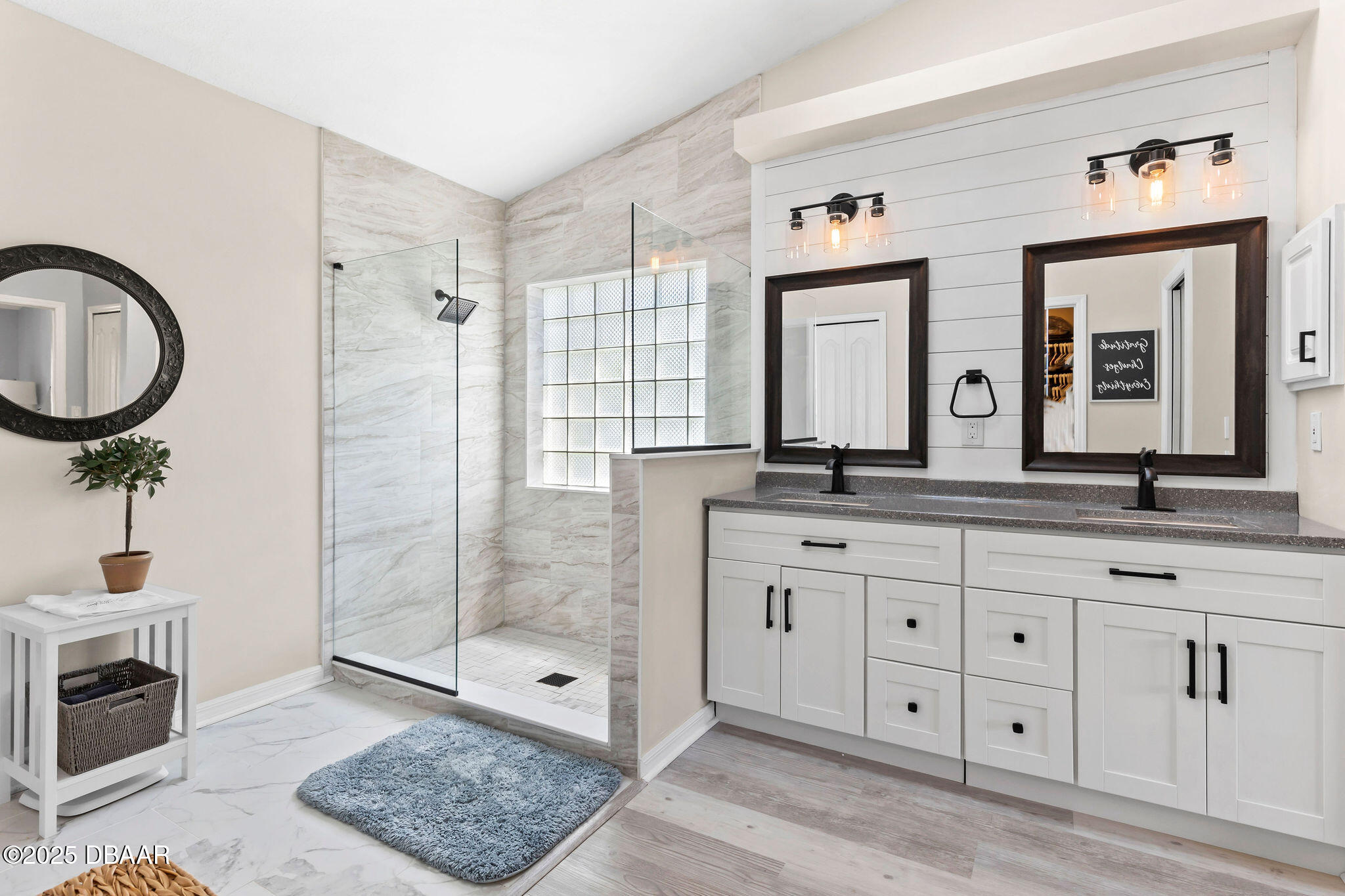 35 China Moon Drive Ormond Beach, FL 32174 - Photo 30 of 40 a bathroom with a granite countertop sink mirror and double
