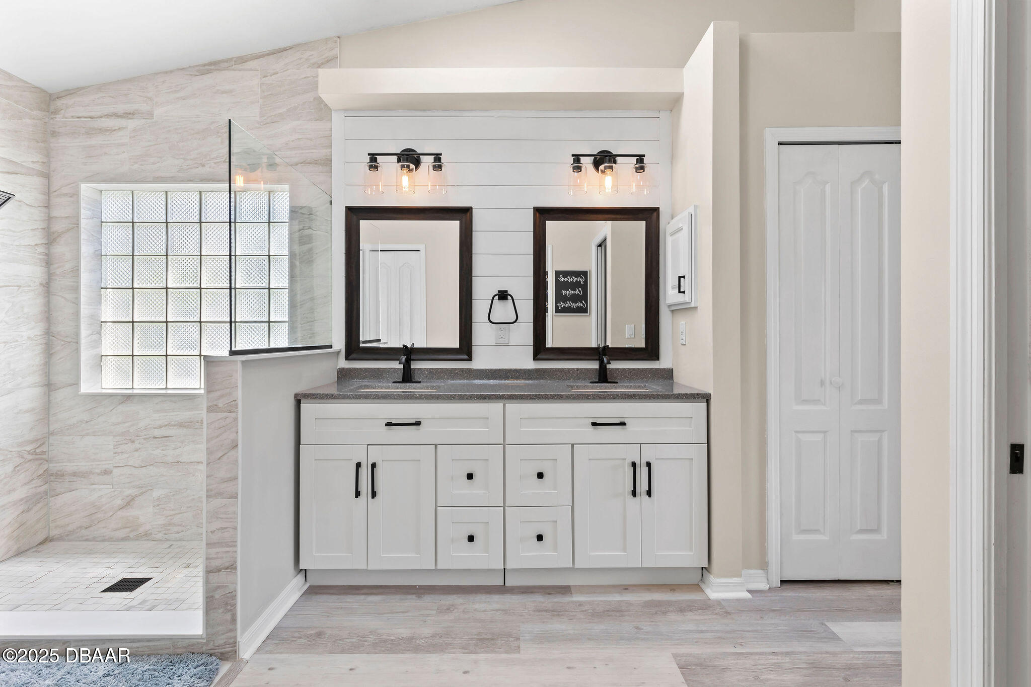 35 China Moon Drive Ormond Beach, FL 32174 - Photo 31 of 40 a bathroom with a granite countertop sink mirror and