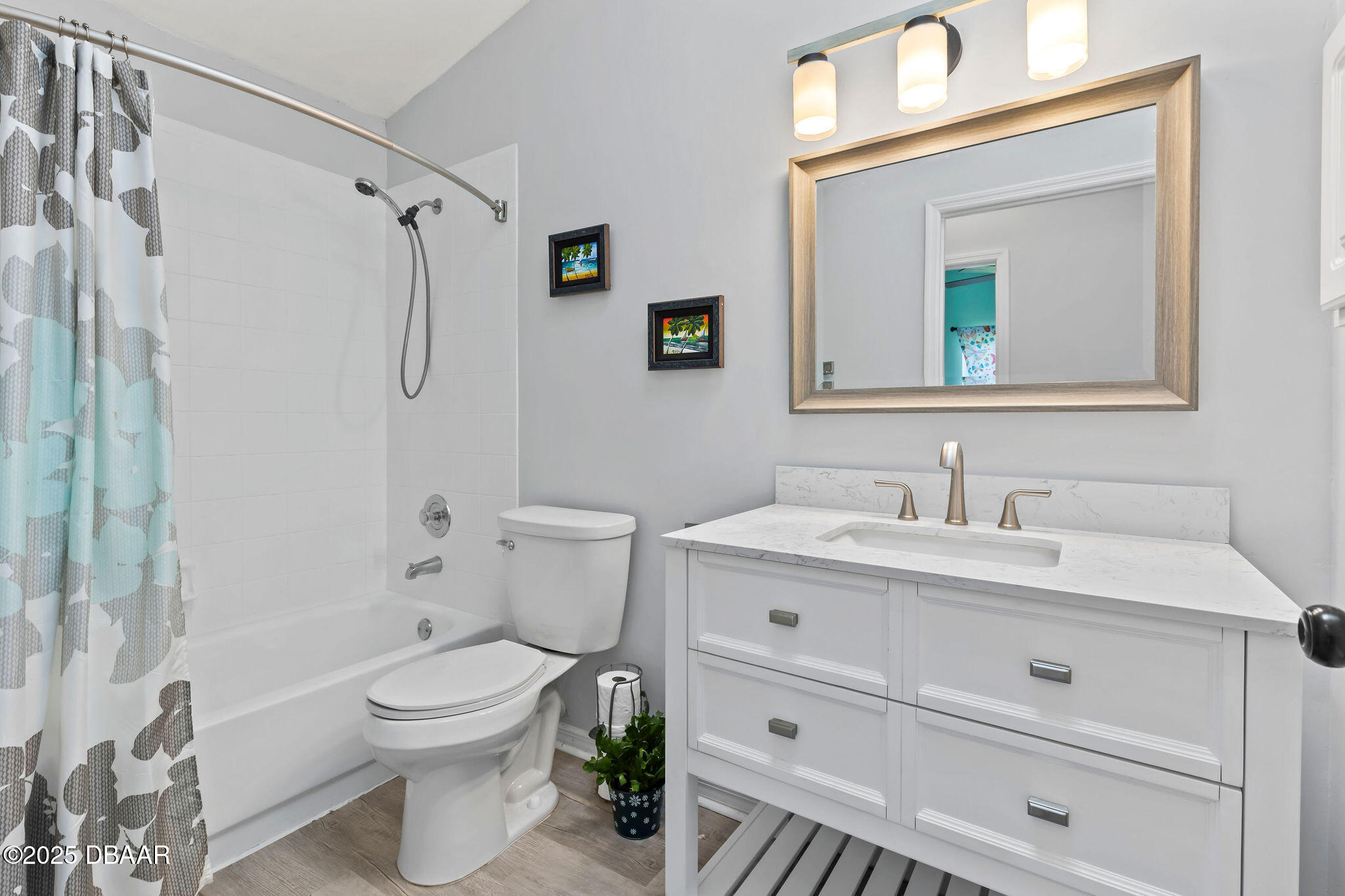 35 China Moon Drive Ormond Beach, FL 32174 - Photo 37 of 40 a bathroom with a granite countertop toilet sink and mirror