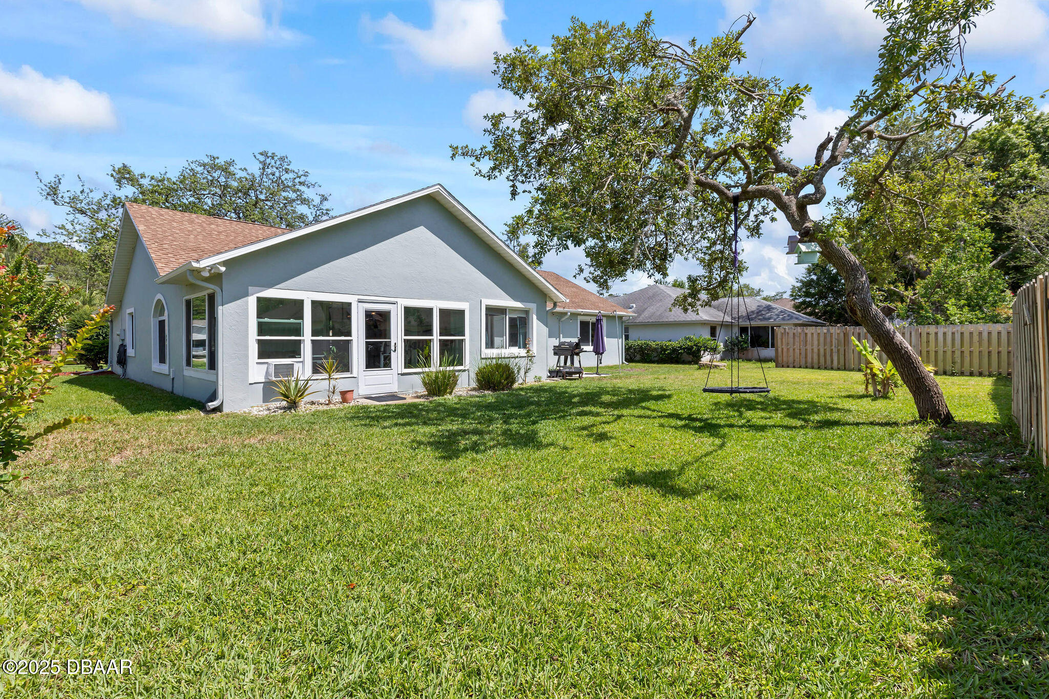 35 China Moon Drive Ormond Beach, FL 32174 - Photo 38 of 40 a front view of a house with a yard