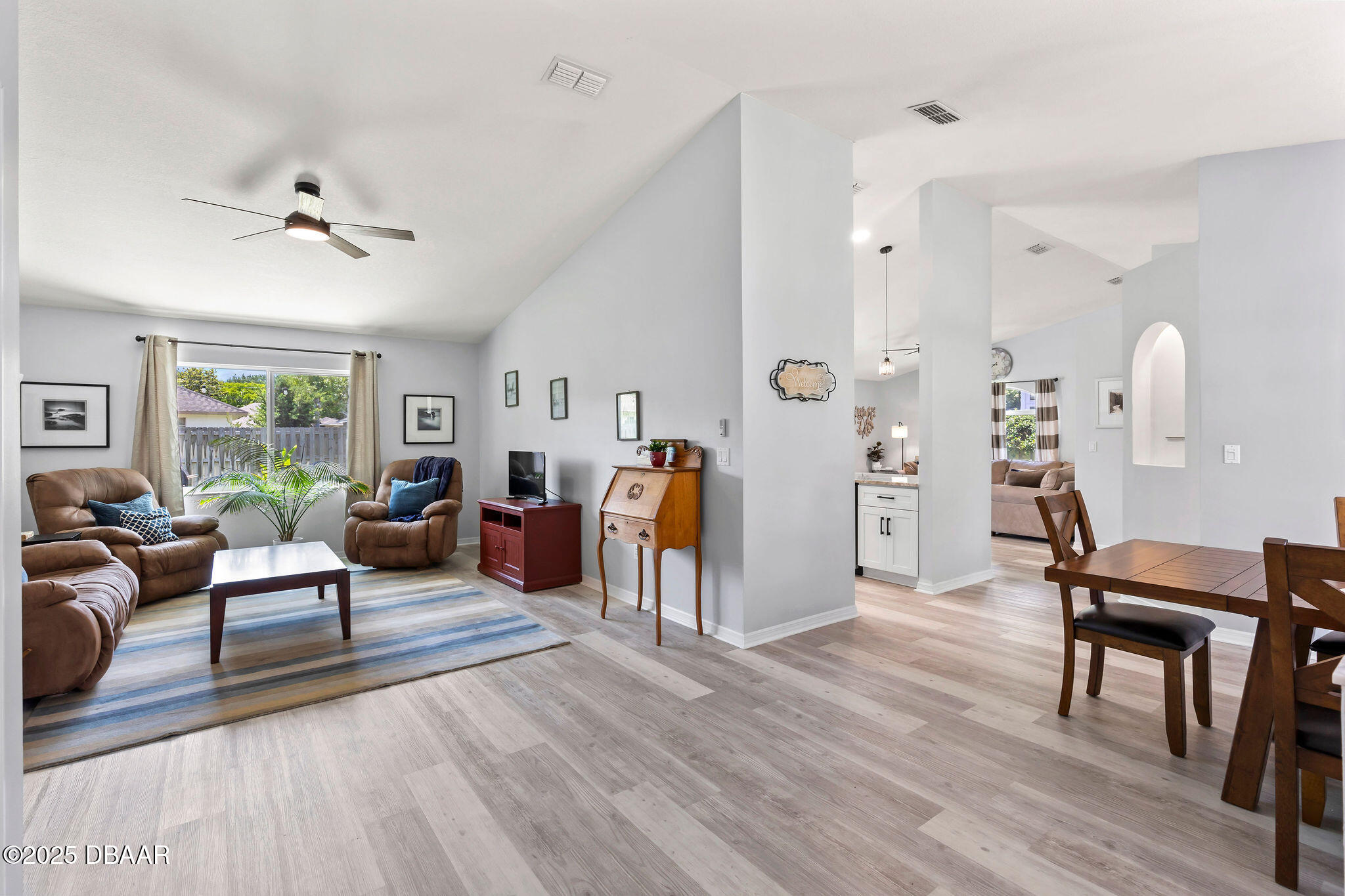 35 China Moon Drive Ormond Beach, FL 32174 - Photo 5 of 40 a living room with furniture a ceiling fan and a window
