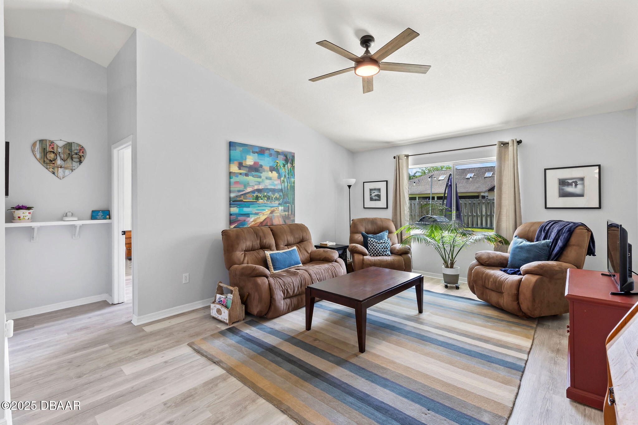 35 China Moon Drive Ormond Beach, FL 32174 - Photo 6 of 40 a living room with furniture and a large window