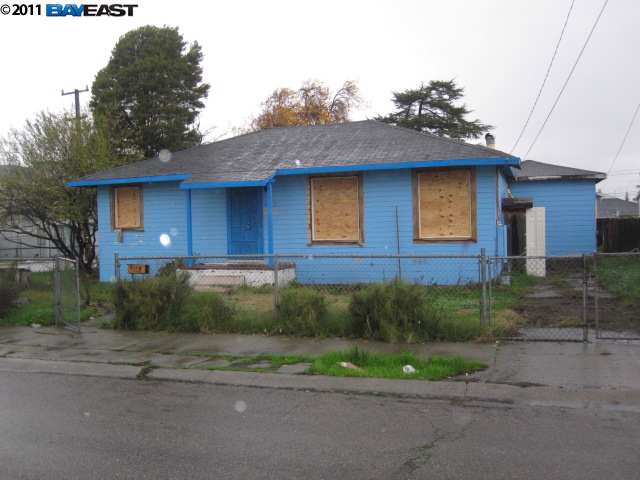 201 Makin Road Oakland, CA 94603 - Photo 1 of 1 a front view of a house with a yard