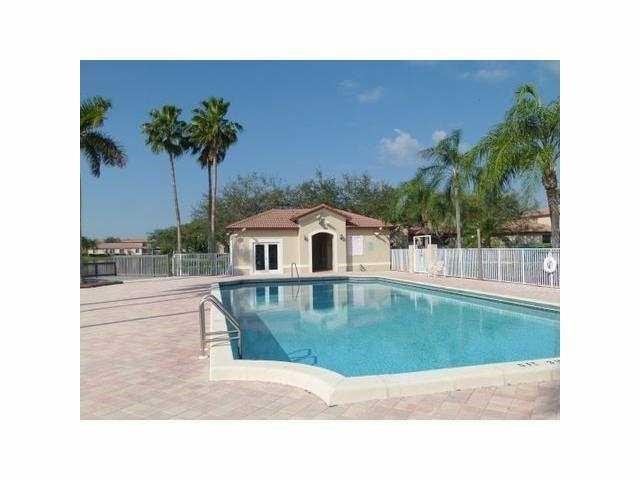16150 Emerald Cove Road, Unit 16150 Weston, FL 33331 - Photo 13 of 17 a picture of a person on a street