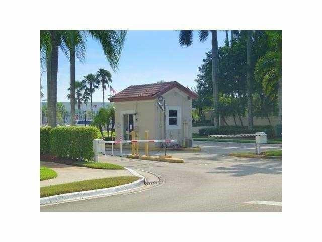16150 Emerald Cove Road, Unit 16150 Weston, FL 33331 - Photo 17 of 17 a view of a house with a backyard