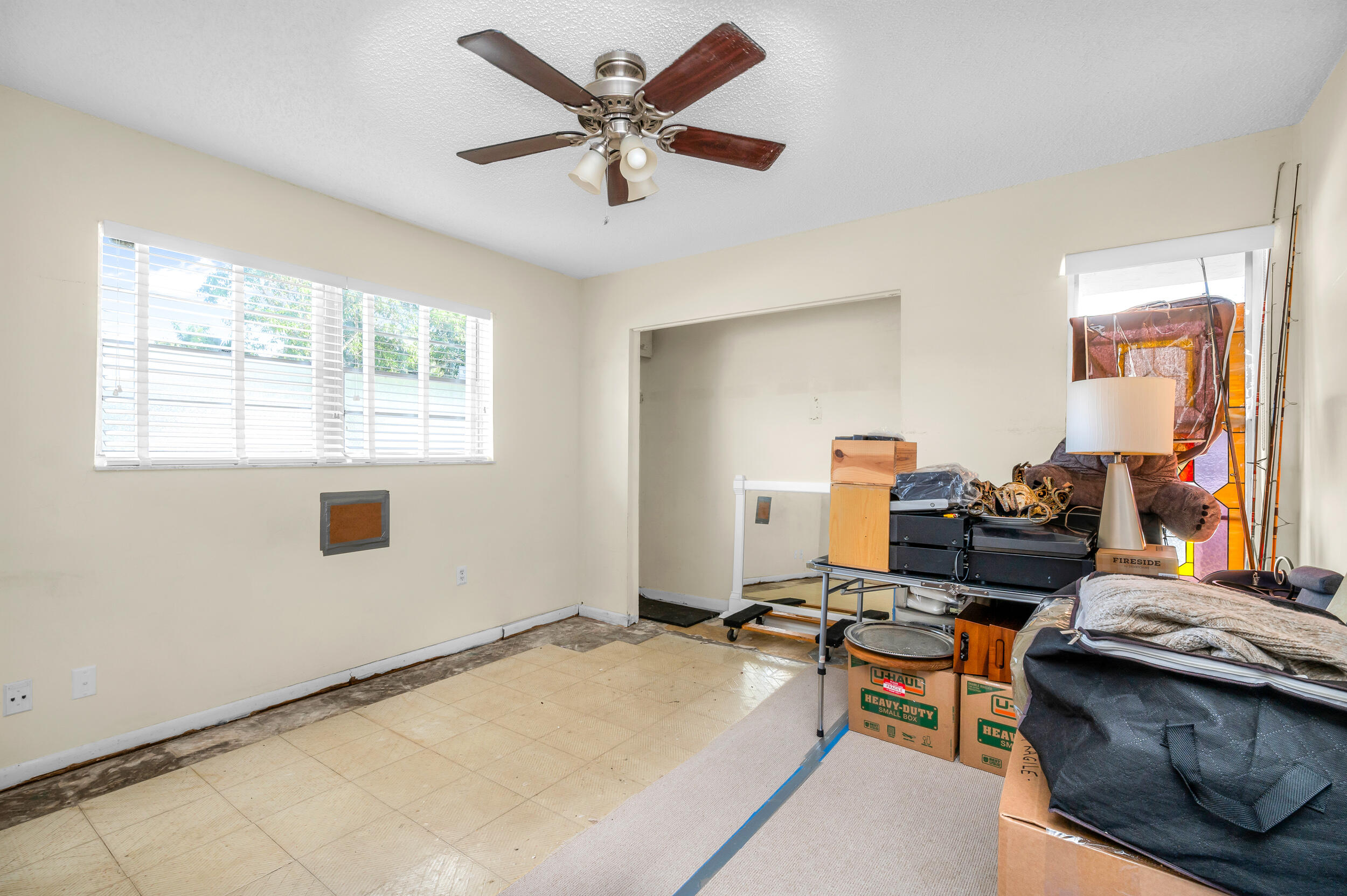 801 Southwest 12th Place Fort Lauderdale, FL 33315 - Photo 11 of 26 a bedroom with furniture and a window