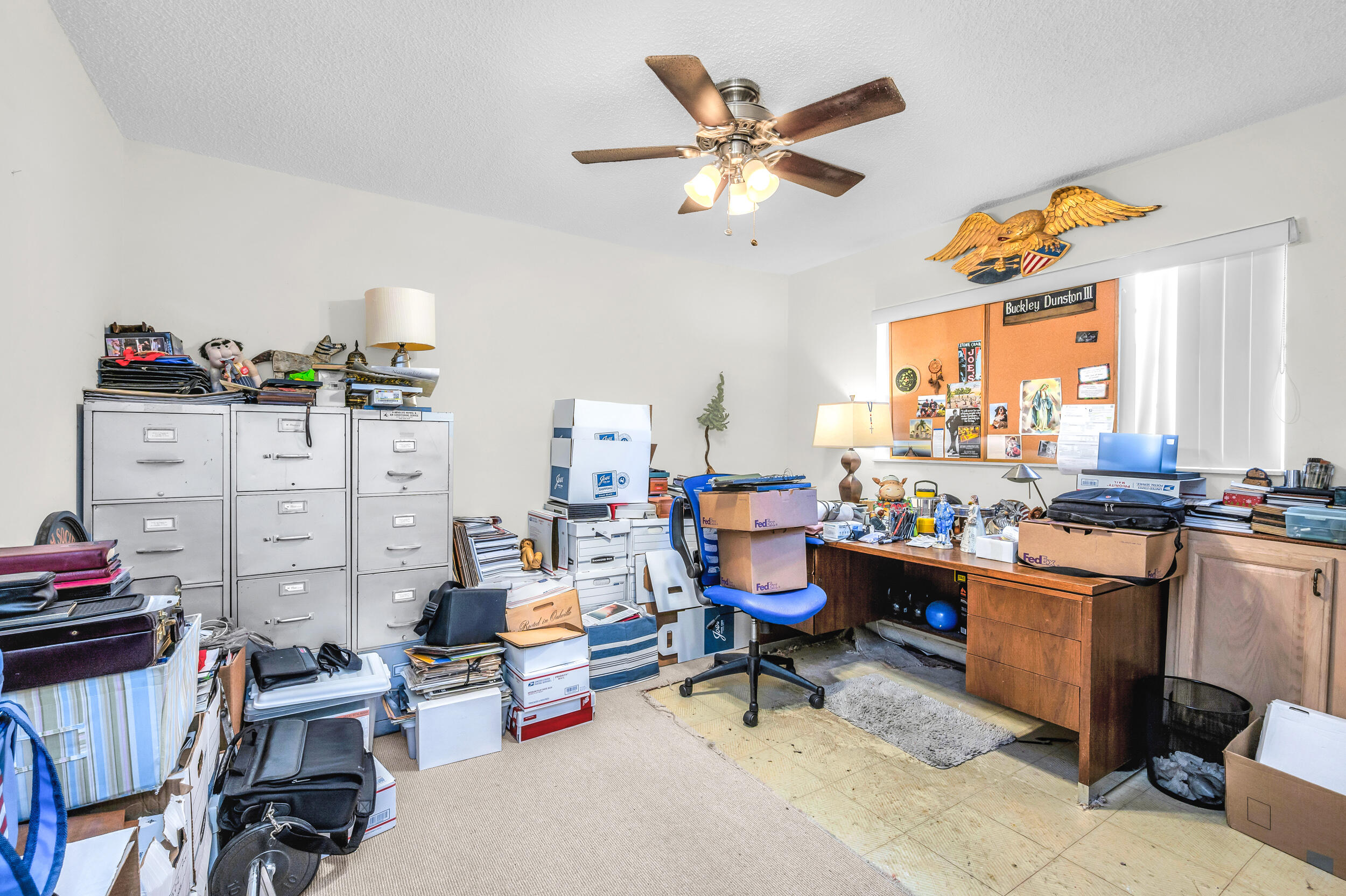 801 Southwest 12th Place Fort Lauderdale, FL 33315 - Photo 12 of 26 a living room with furniture a rug and a large window