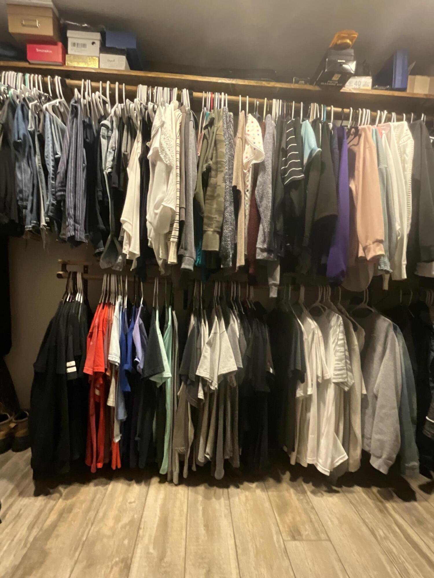211 Reed Avenue Whitharral, TX 79336 - Photo 11 of 20 a view of walk in closet with clothes and shoes