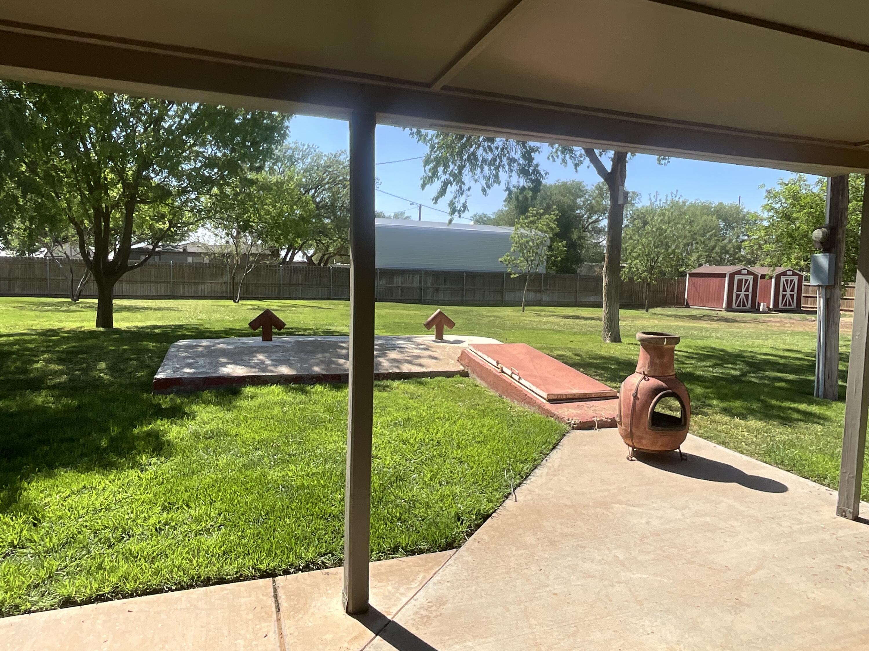 211 Reed Avenue Whitharral, TX 79336 - Photo 20 of 20 a view of a park with furniture and garden