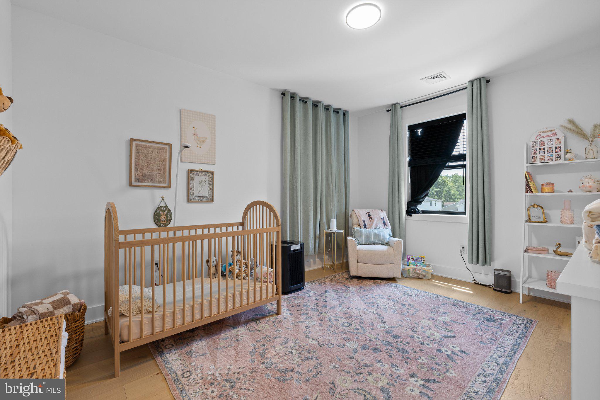 985 Henry Avenue Wayne, PA 19087 - Photo 24 of 28 Serene nursery with soft hues.