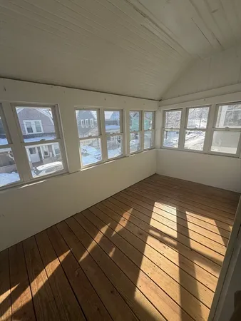 a view of an empty room and window