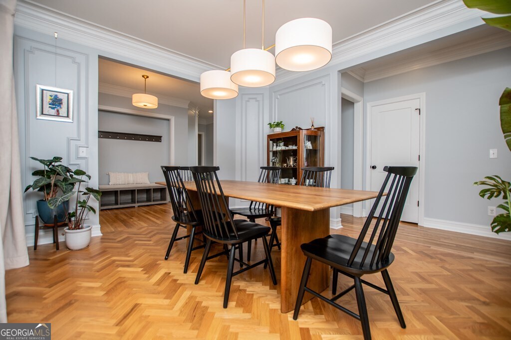1745 Stripling Chapel Road Carrollton, GA 30116 - Photo 12 of 69 a view of a dining room with furniture and wooden floor
