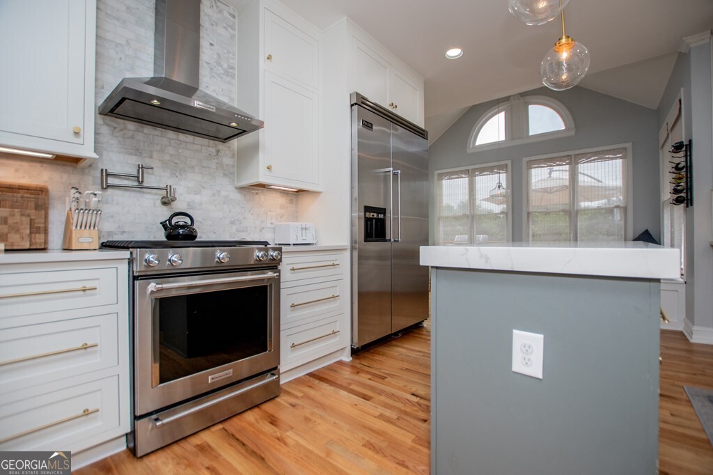 1745 Stripling Chapel Road Carrollton, GA 30116 - Photo 24 of 69 a kitchen with a stove and a microwave