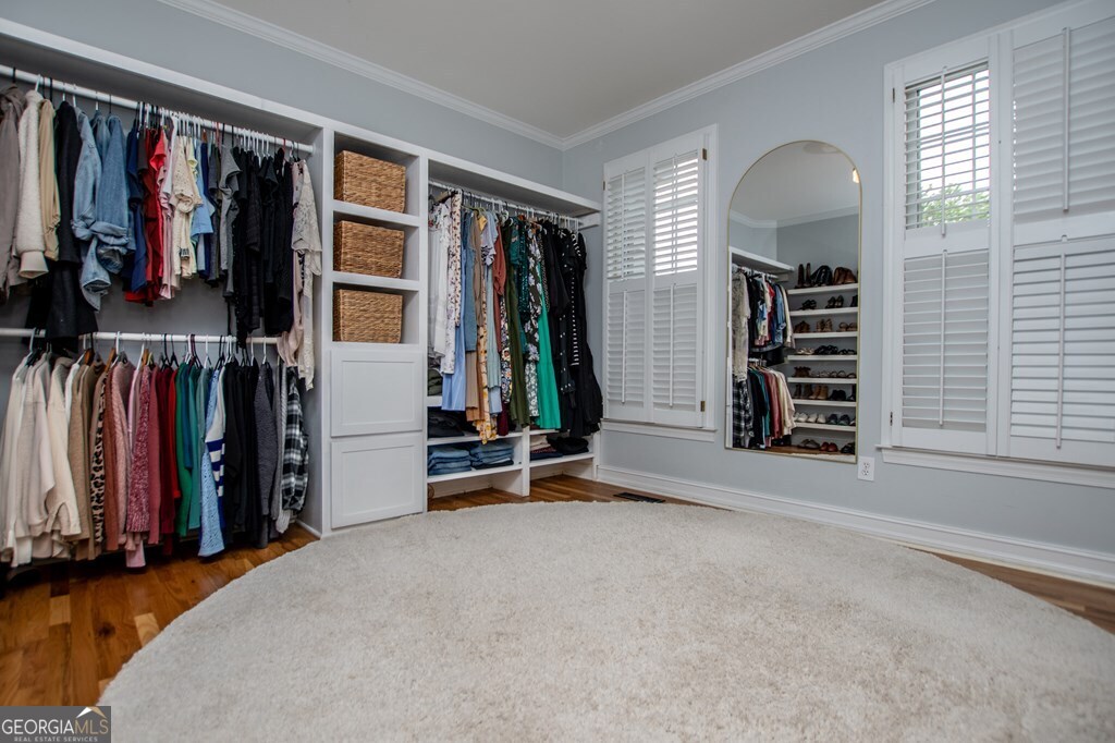 1745 Stripling Chapel Road Carrollton, GA 30116 - Photo 31 of 69 a view of walk in closet with clothes and shoes