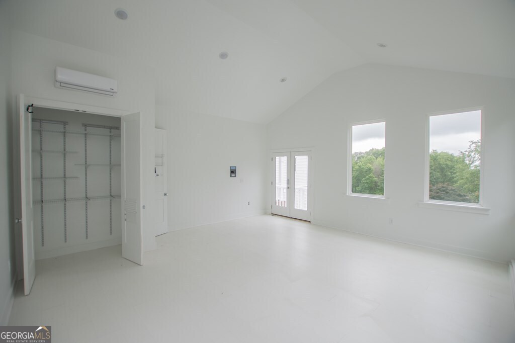 1745 Stripling Chapel Road Carrollton, GA 30116 - Photo 47 of 69 an empty room with windows and closet