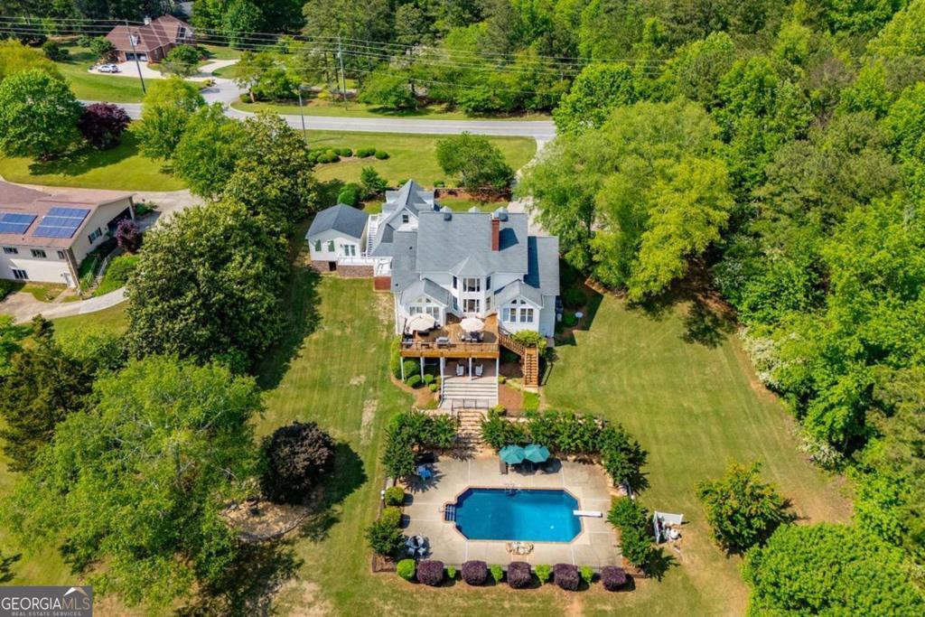 1745 Stripling Chapel Road Carrollton, GA 30116 - Photo 63 of 69 an aerial view of a house with yard swimming pool and outdoor seating