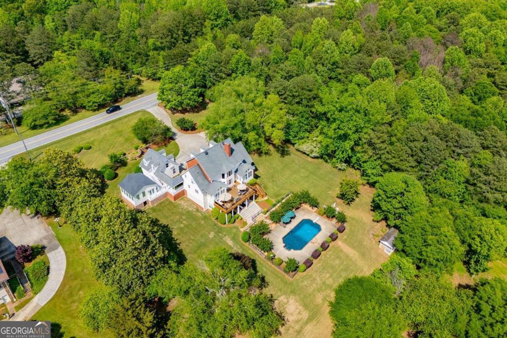 1745 Stripling Chapel Road Carrollton, GA 30116 - Photo 69 of 69 an aerial view of residential house with outdoor space and trees all around
