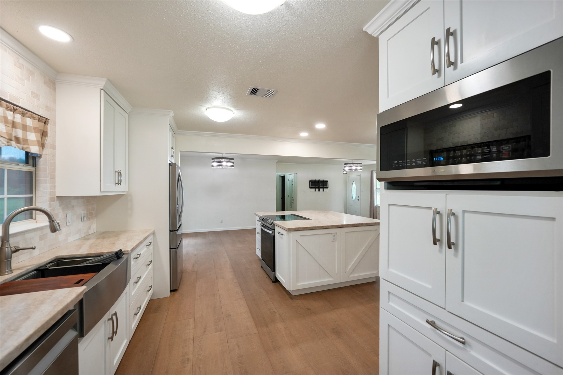 19635 Kermier Road Waller, TX 77484 - Photo 9 of 27 Updated kitchen with abundant cabinetry, generous counter space, and a functional layout.