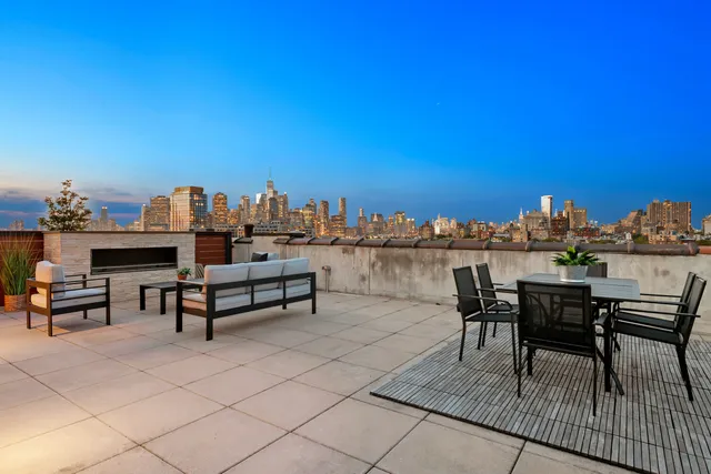 a view of a terrace with sitting area