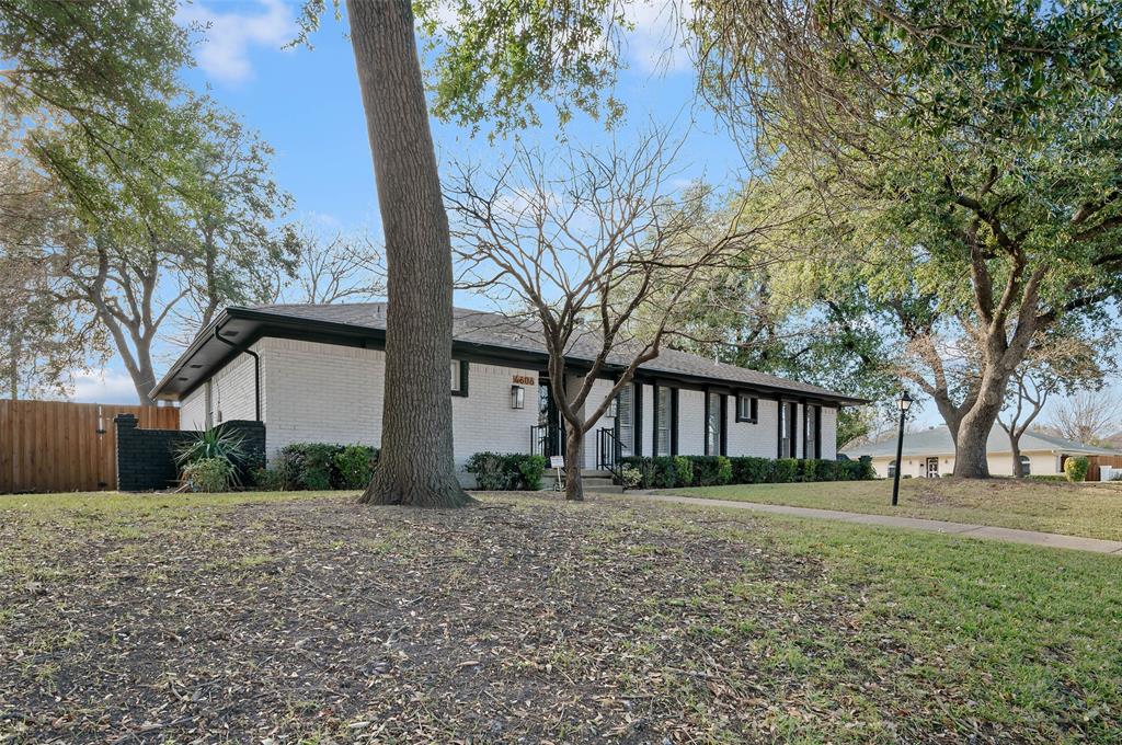 4606 Hazelhurst Lane Dallas, TX 75227 - Photo 2 of 30 a view of a yard in front of a house