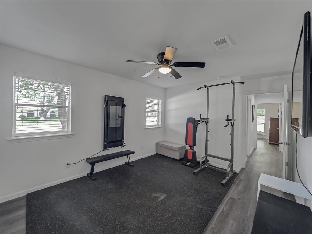 4606 Hazelhurst Lane Dallas, TX 75227 - Photo 26 of 30 a view of a room with gym equipment