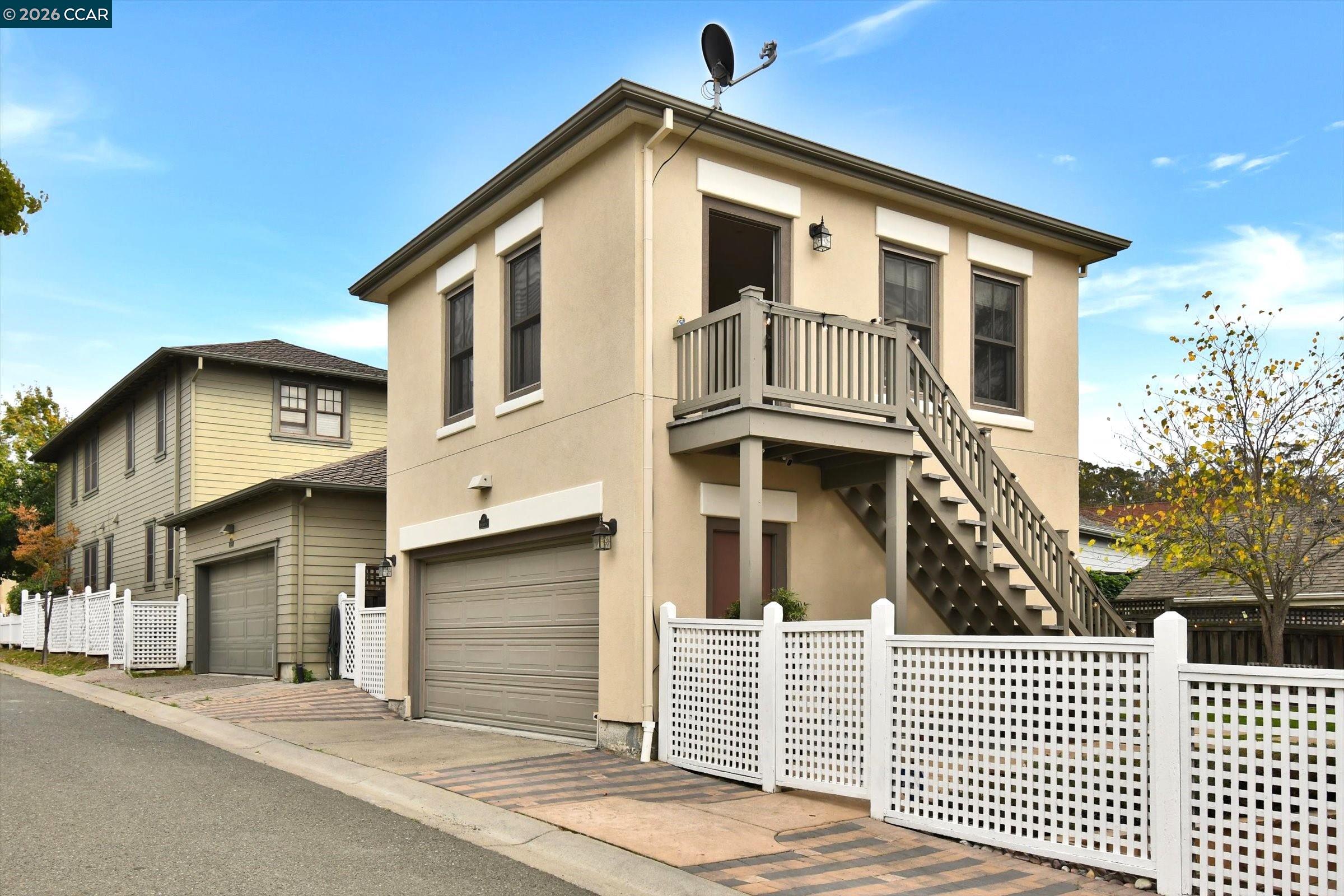 1018 Promenade Street Hercules, CA 94547 - Photo 9 of 60 a view of a house with a garage