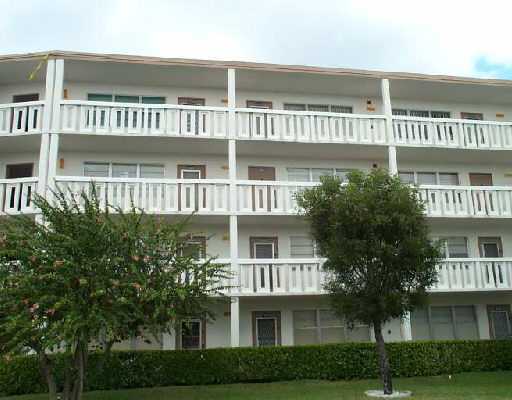 2053 Cornwall C, Unit 2053C Boca Raton, FL 33434 - Photo 1 of 1 a view of a large building
