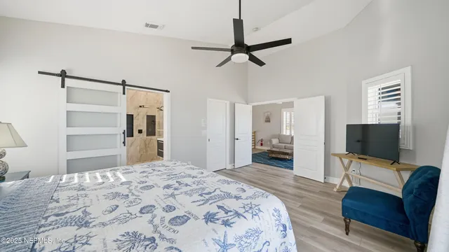 a bathroom with a sink vanity and mirror