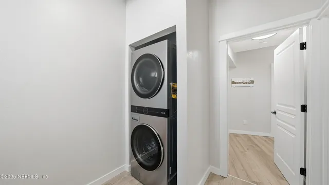 a view of multiple houses with a yard