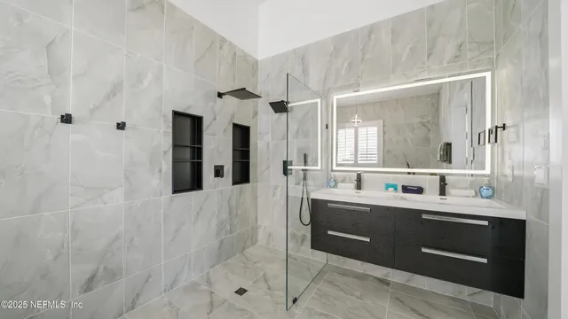 a kitchen with stainless steel appliances granite countertop a stove and a sink