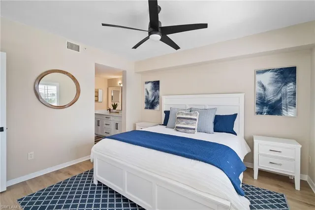 a bathroom with a sink a mirror and a shower