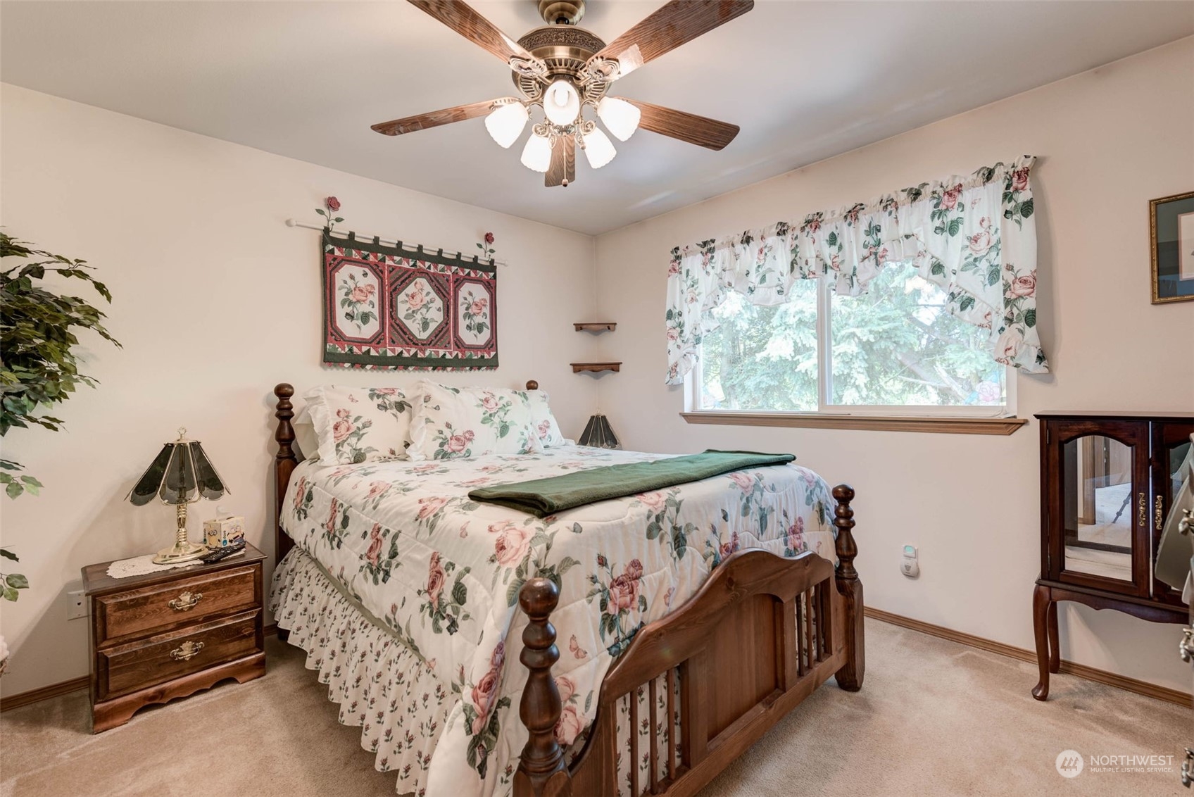 225 99th Place Southwest Everett, WA 98204 - Photo 11 of 30 a bedroom with a bed and a chandelier